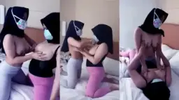 Sensual Embrace: Two Veiled Lovers Caressing In Intimacy