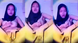 Jilbab Hitam Basah Merintih Nafsu Sambil Jari Sibuk Di Bawah.
